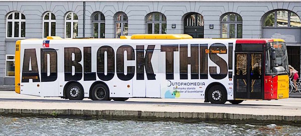 bus emblazoned with "adblock this!"