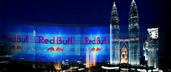 Red bull digital billboard dominating night sky