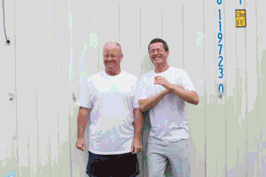 GIF: employees colour bombing Mark and Dave