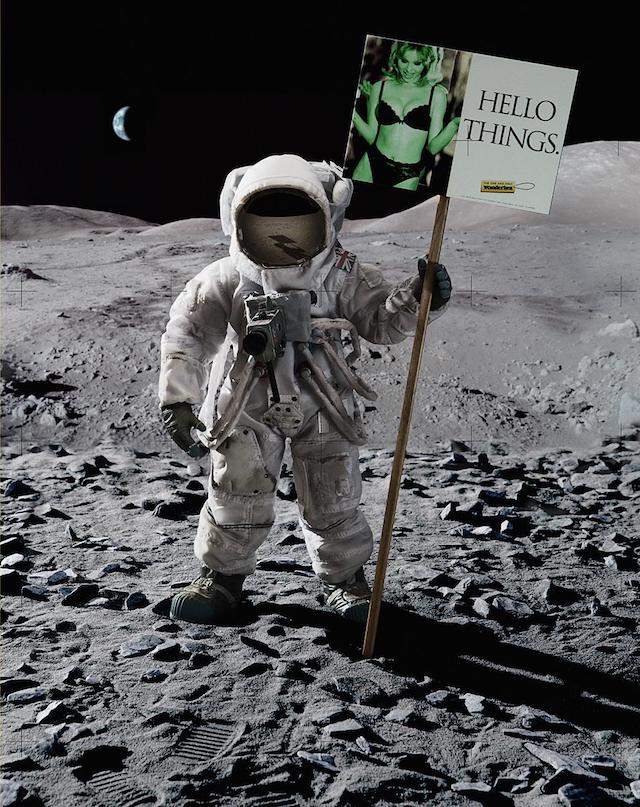 Astronaut on moon with ad poster for lingerie